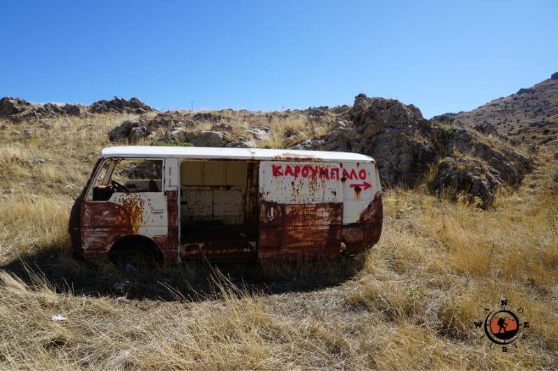 The iconic van with 'Karoumpalo' inscription on the mountain trail of Mount Trachy in Arcadia, Greece